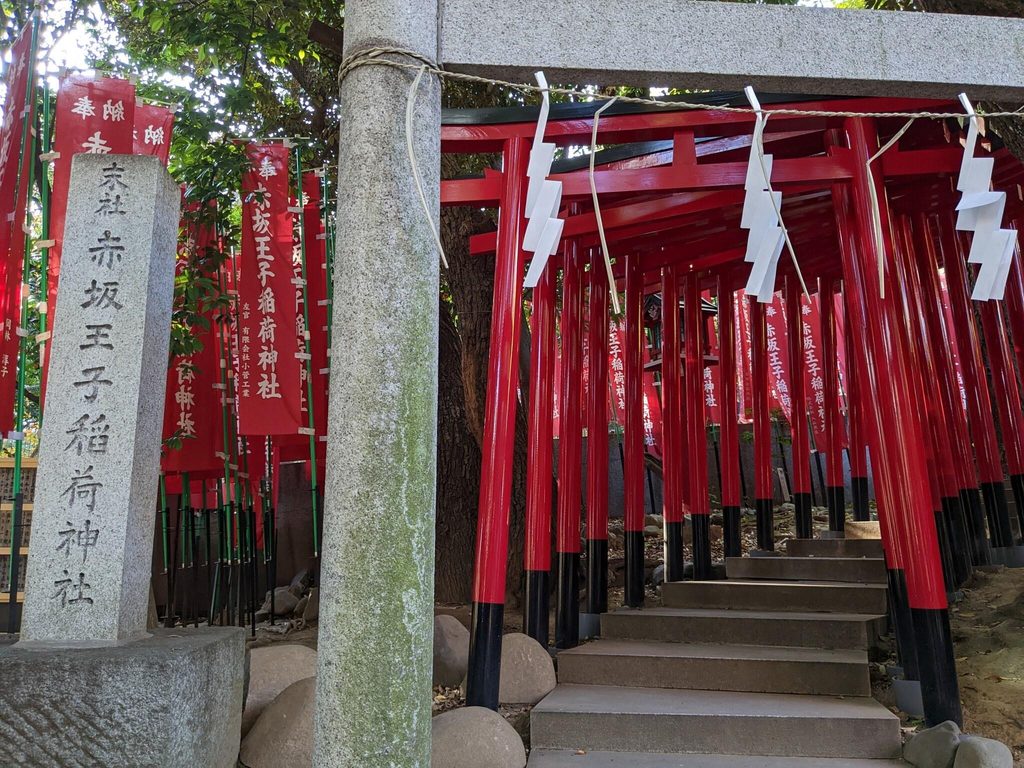 Red torii gates over stone steps at Akasaka Oji Inari Shrine inside Nogi Shrine Red torii gates over stone steps at Akasaka Oji Inari Shrine inside Nogi Shrine