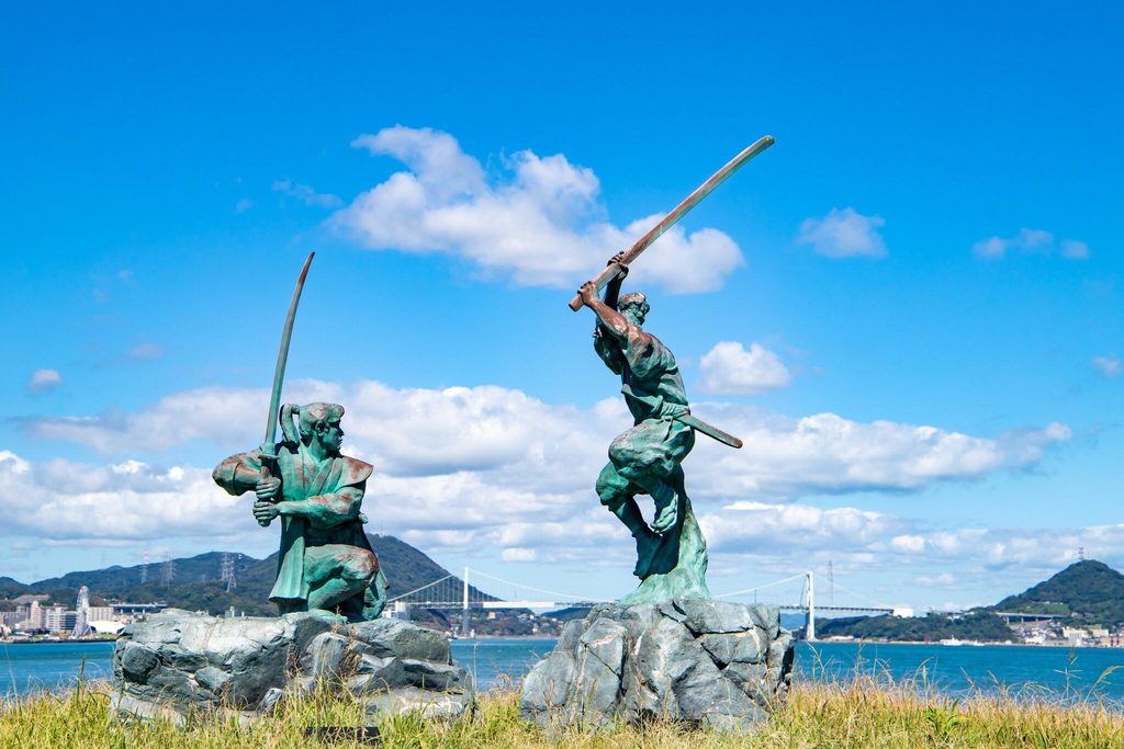 Statues of Miyamoto Musashi and Sasaki Kojiro at the Ganryujima duel site Statues of Miyamoto Musashi and Sasaki Kojiro at the Ganryujima duel site