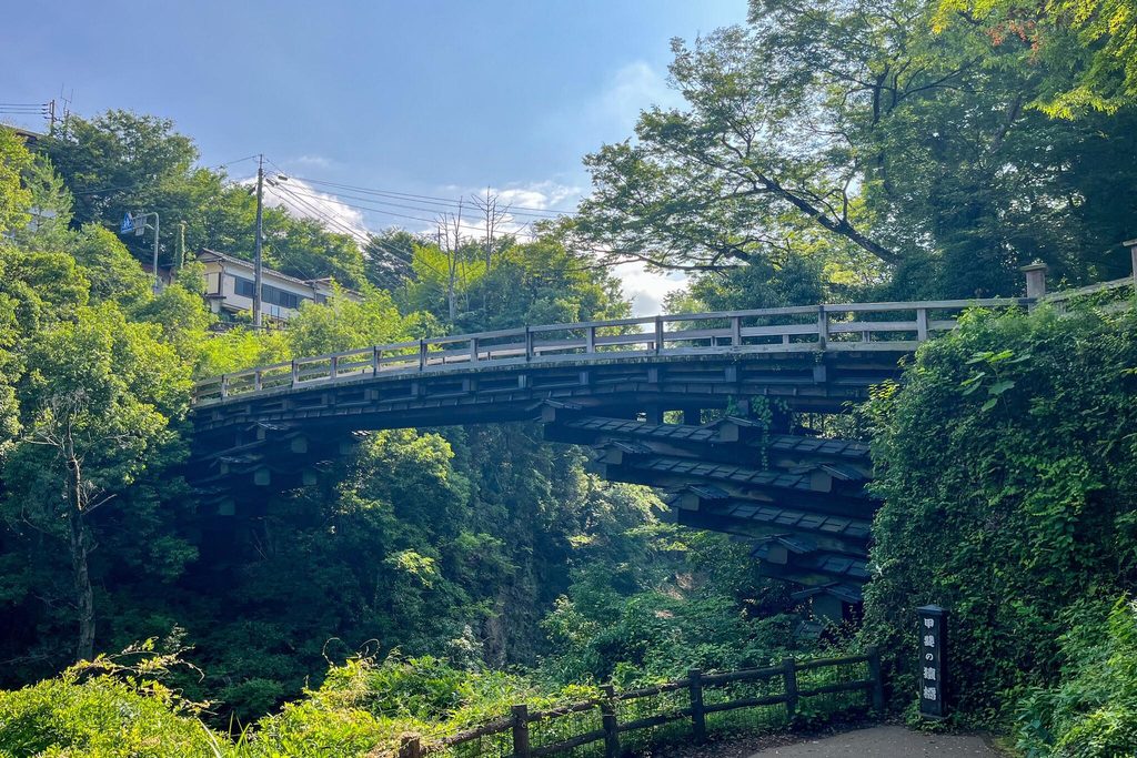 Saruhashi, the monkey bridge, with its stacked timber beams above the Katsura River gorge