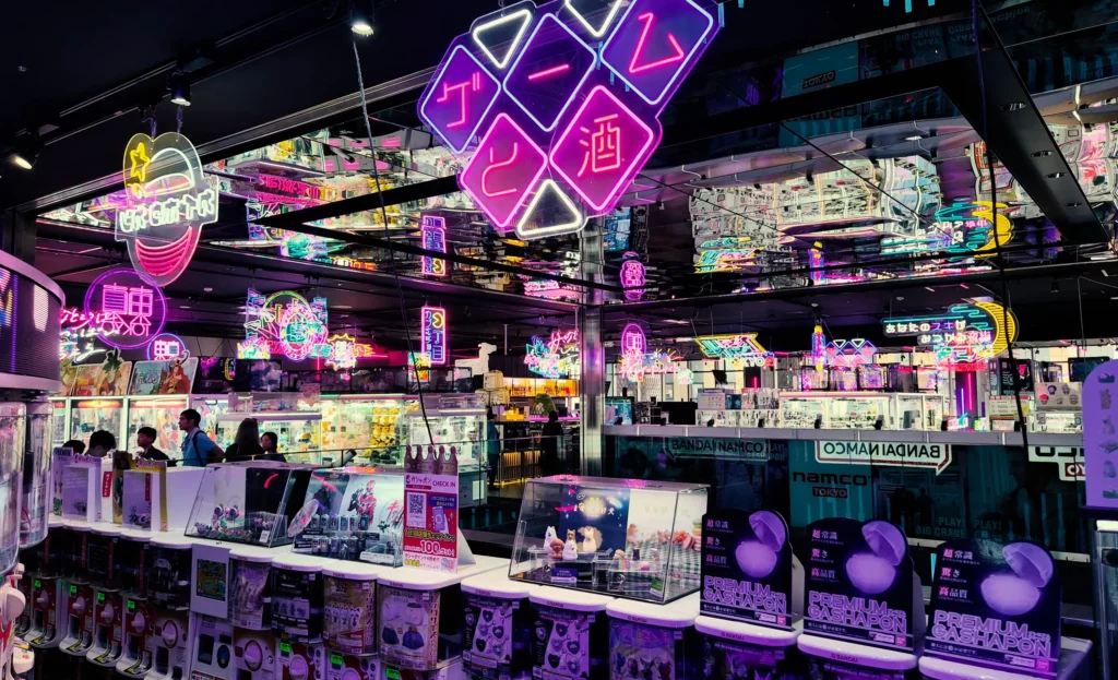 Neon-lit gachagacha and arcade machines at namco TOKYO, Tokyu Kabukicho Tower