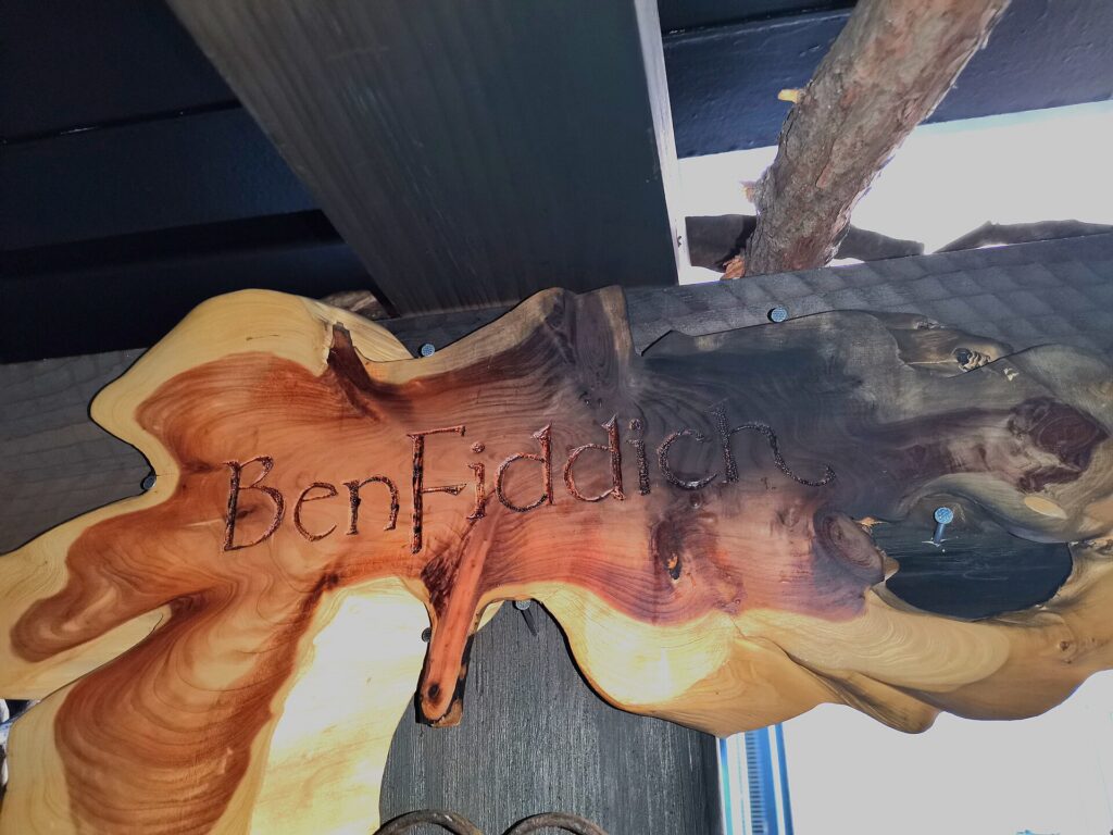 Bar BenFiddich Tokyo: carved wooden BenFiddich sign at the Nishi-Shinjuku bar