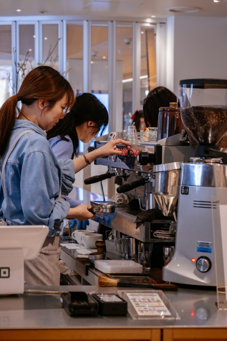 Best coffee in Tokyo: baristas making coffee at a café counter