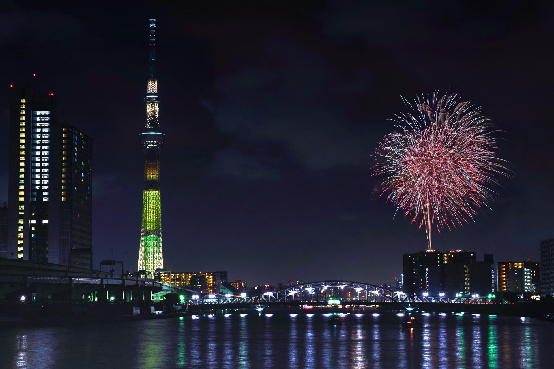 Japan fireworks calendar: fireworks over the Sumida River with Tokyo Skytree