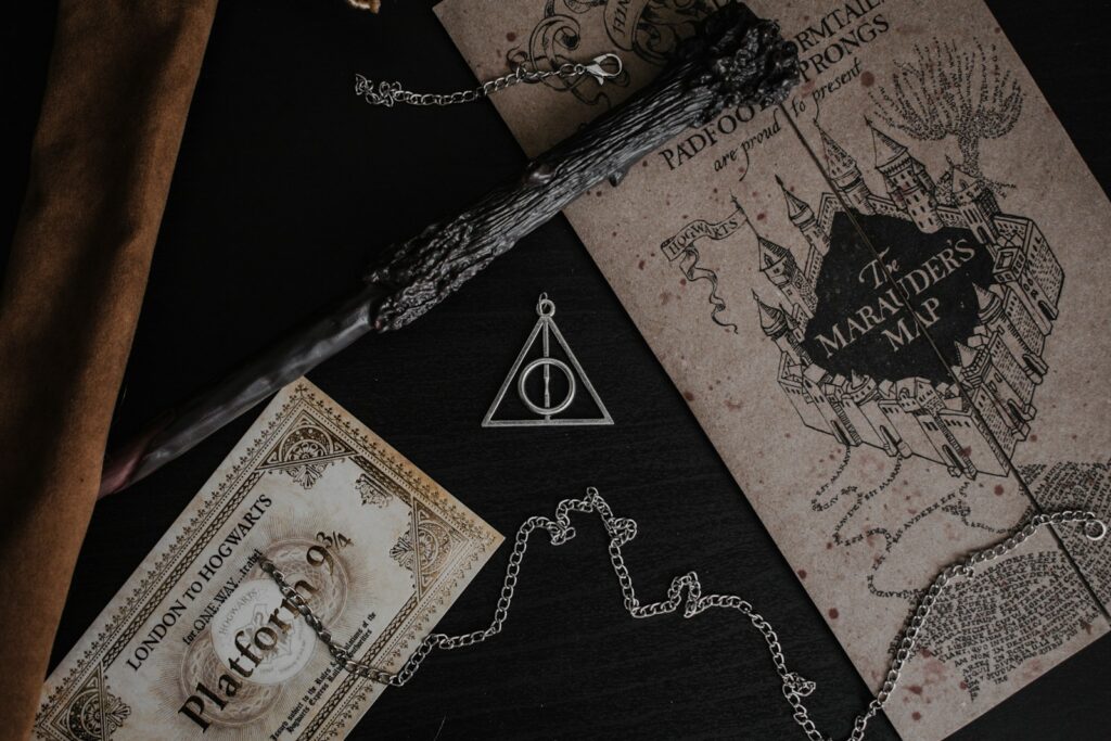 Harry Potter note and wand on a table, planning a Studio Tour Tokyo Magical Winter visit