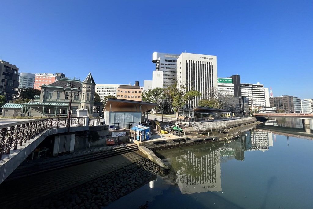 The Naka River at Tenjin Central Park in Fukuoka, beside the Former Fukuoka Prefectural Hall Guesthouse, a short walk from the Nakasu yatai The Naka River at Tenjin Central Park in Fukuoka, beside the Former Fukuoka Prefectural Hall Guesthouse, a short walk from the Nakasu yatai
