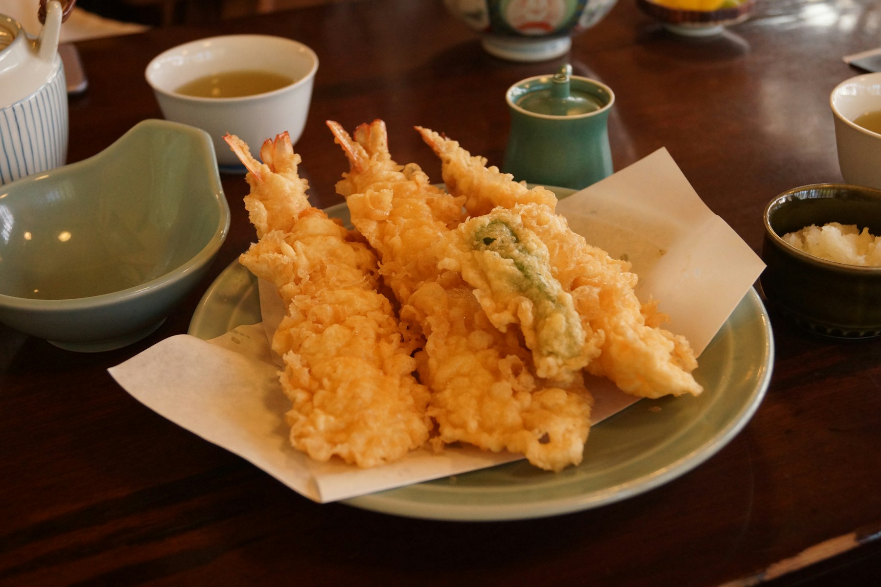 Prawn and vegetable tempura served on paper in Taito, Tokyo