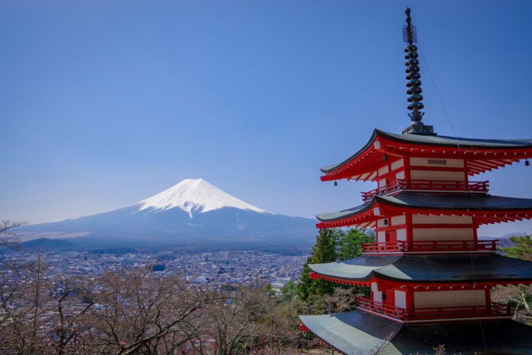 Mt fuji day tour from tokyo: Chureito Pagoda and Mt Fuji under a blue sky in Fujiyoshida, a stop on most Mt Fuji day tours from Tokyo