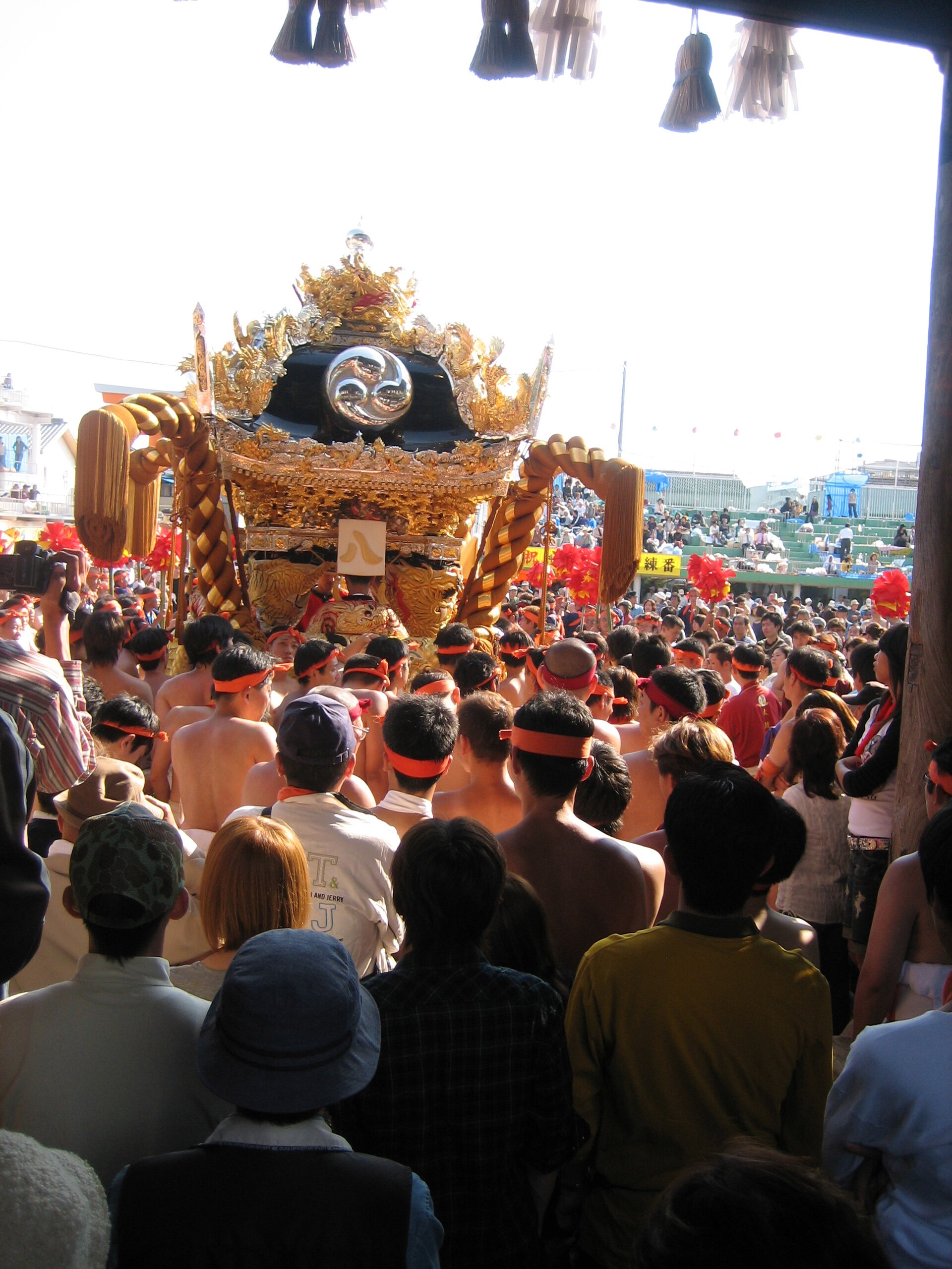 Nada festival team carrying a float