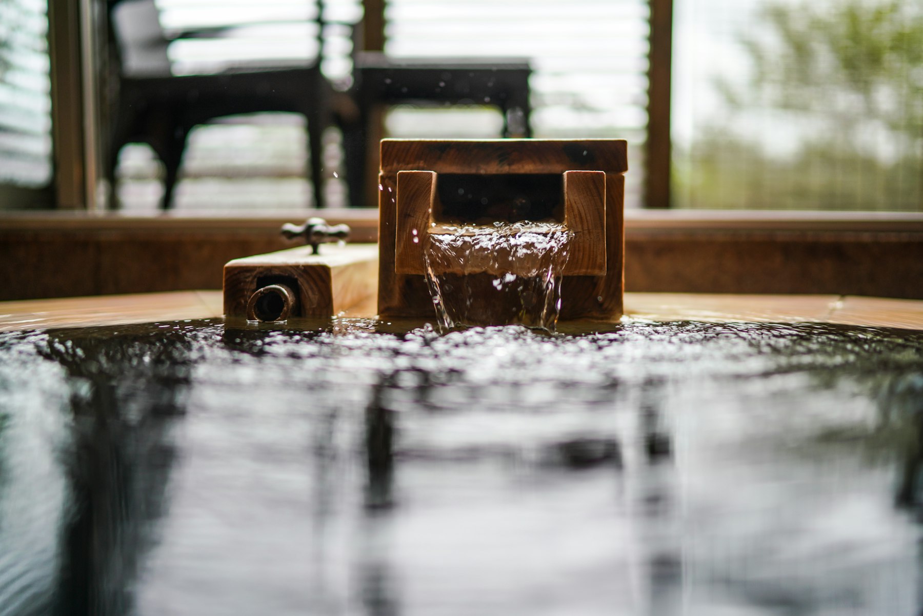 Wooden hot spring bath at a Japanese inn