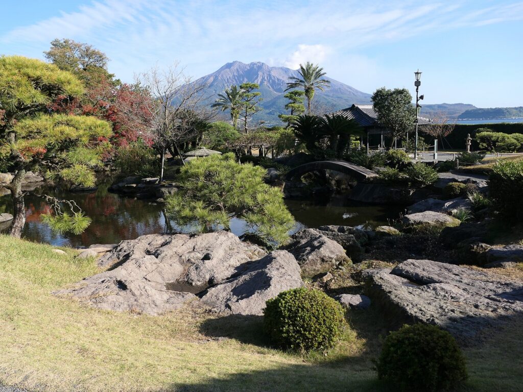 Sengan-en garden in Kagoshima, with pond, rocks and pines and Sakurajima as the borrowed backdrop