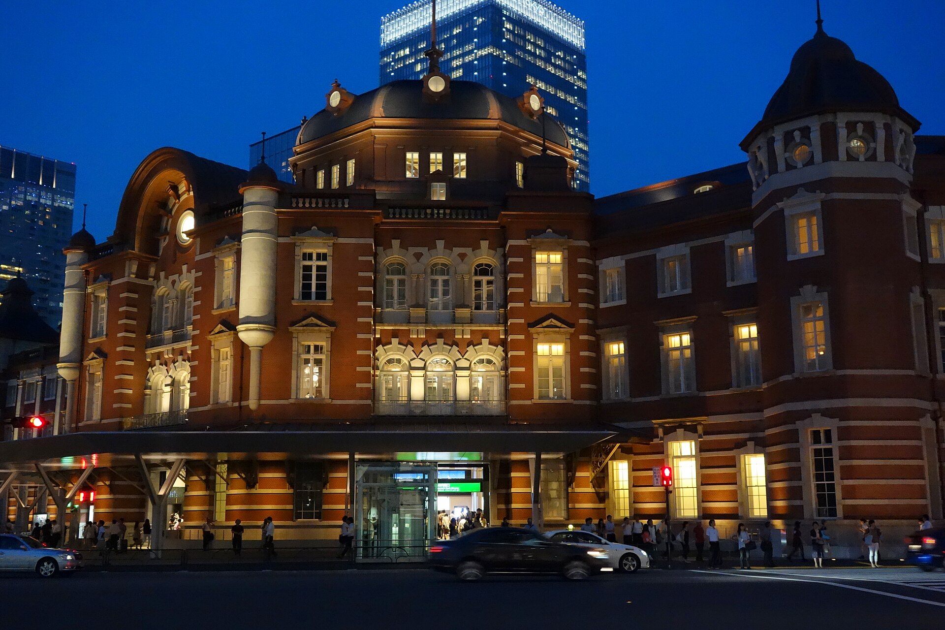 Tokyo Station Marunouchi Building lit up in the evening, near the Sushi Bus Tokyo departure point