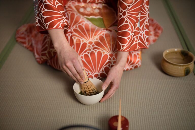 Kimono tea ceremony experience – woman in kimono preparing matcha