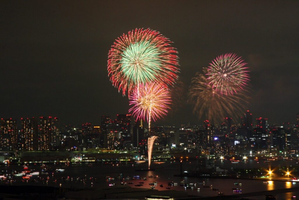 Fireworks over Tokyo Bay and the city skyline