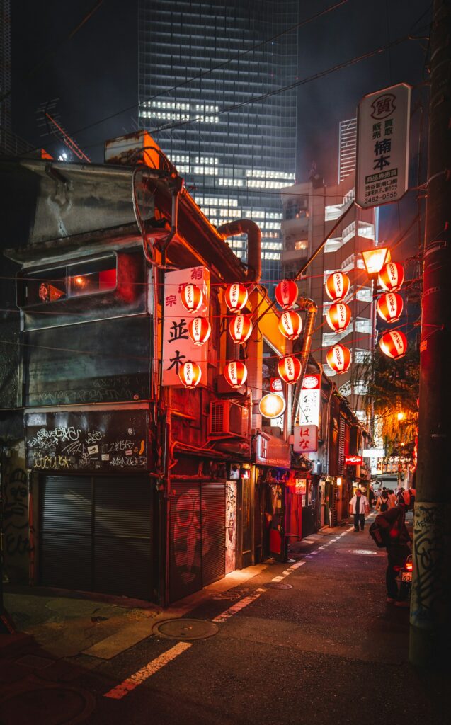 Lantern on a Tokyo street at night, setting for a yokai ghost-story walk at Halloween