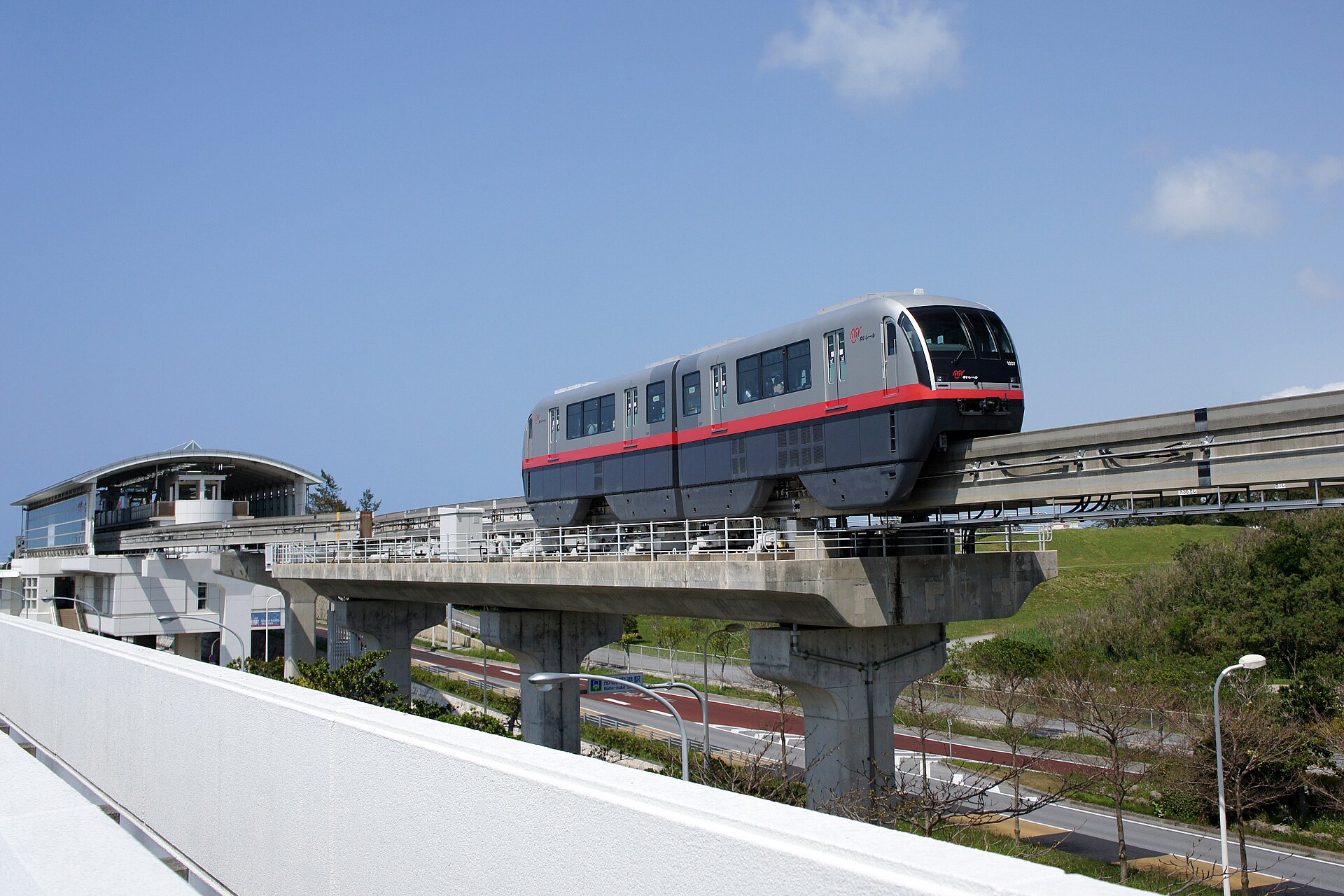 Yui Rail monorail train on the elevated track at Naha Airport Station, Okinawa